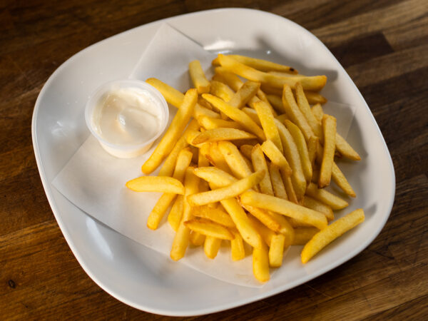 Golden Classic French Fries piled high, a testament to Eastbourne's culinary prowess in crafting comfort food.